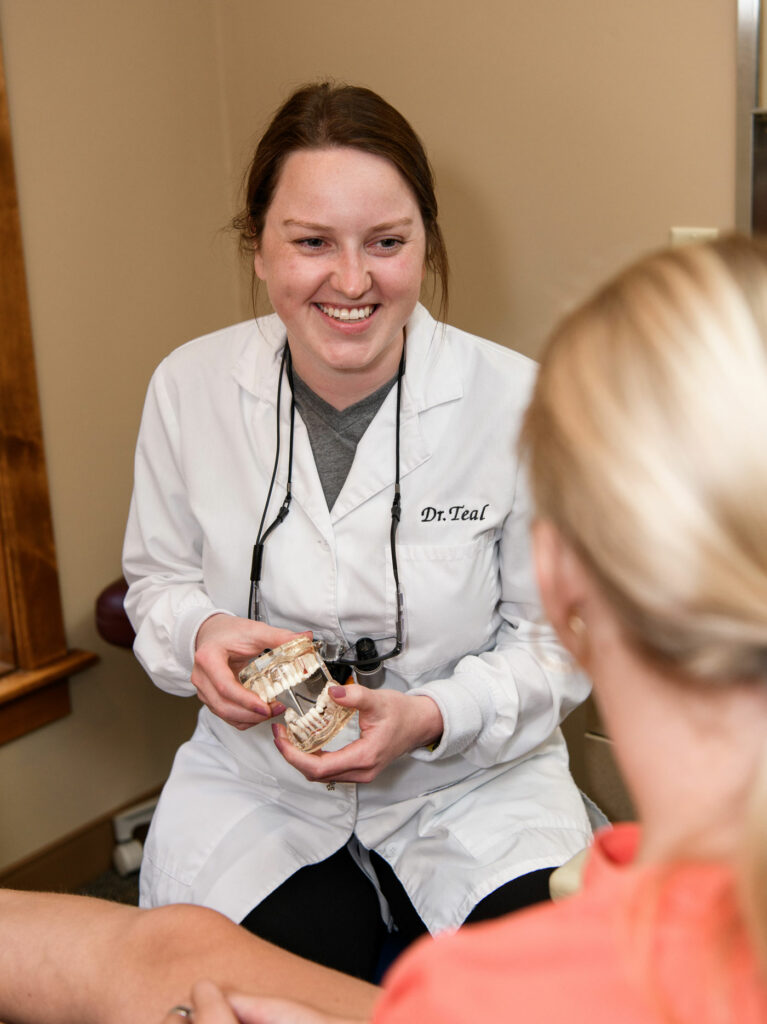 Dr. Teal Estes with patient